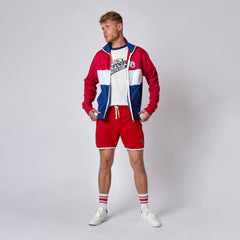 //merch.devolverdigital.com/cdn/shop/products/Trackie_Top_21---STORE_1024x1024.jpg?v=1659699501 DAC Track Top
